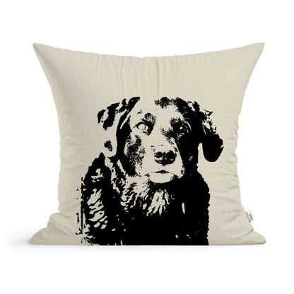A cream-colored pillow with a black ink-style illustration of a Labrador on the front. The dog, named Gus Gus, appears calm, featuring its face and part of its chest. This minimalistic, high-contrast design makes the **Gus Gus Black Lab Pillow** from **Rustic County** perfect for any dog enthusiast's home decor.