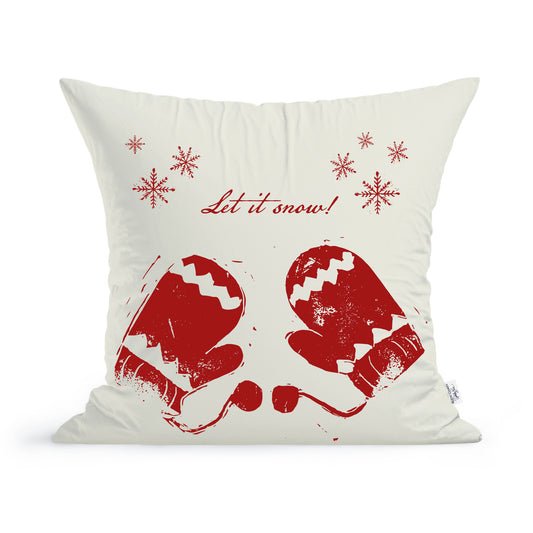 The Let it Snow Pillow by Rustic County is a white cushion beautifully decorated with red illustrations of winter mittens and snowflakes, encapsulating the holiday decor spirit with its cheerful "Let it snow!" script. Welcome the winter charm into your home with this charming addition.