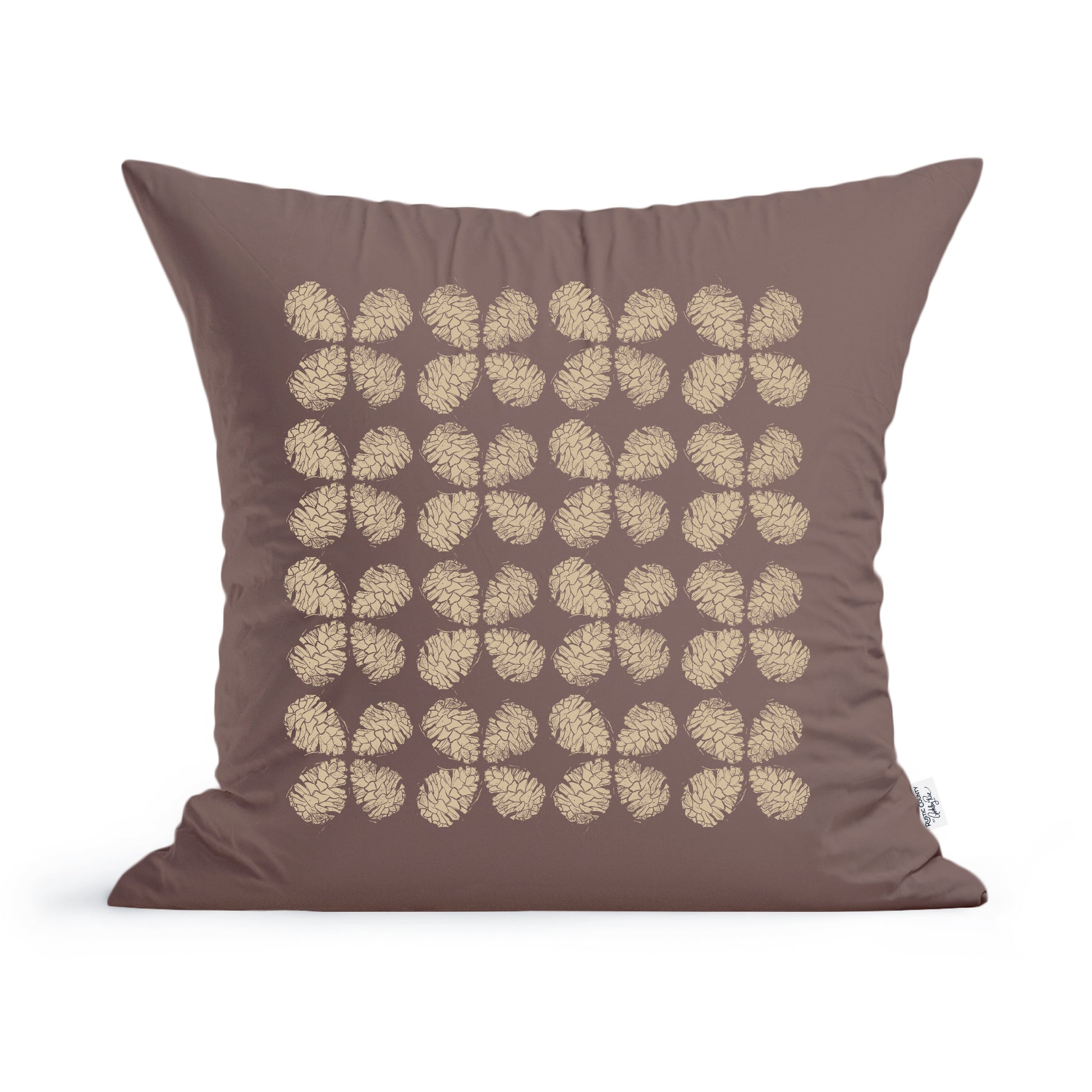 A square brown pillow with a pinecone pattern of small, golden leaves arranged in a grid across its front. The fabric appears smooth, and the leaves' detailed design adds an elegant touch to this Maine Pinecones Pillow by Rustic County.