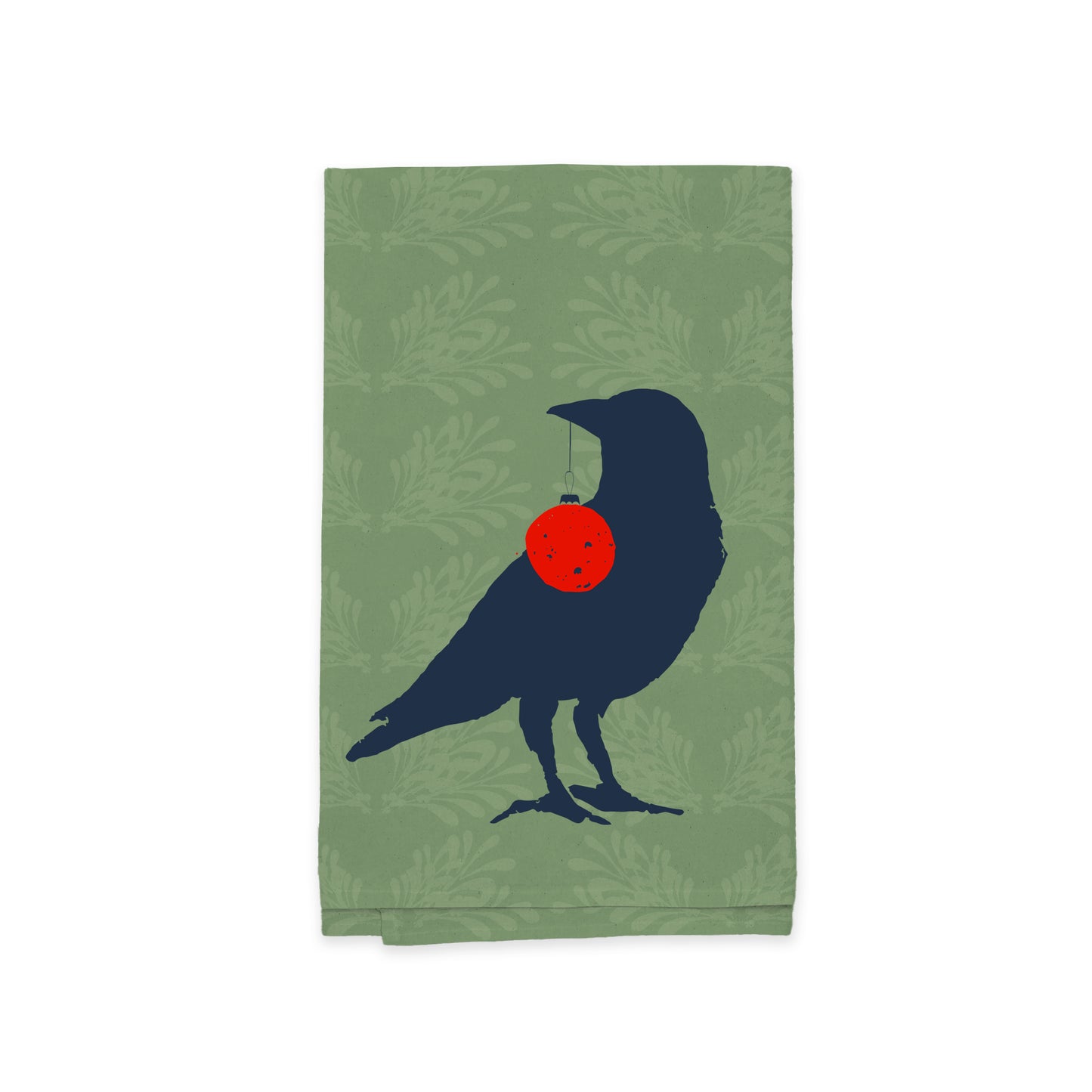 The Rustic County Yuletide Crow Kitchen Tea Towel features a crow's silhouette holding a red ornament against a gentle leafy backdrop. Ideal for holiday gifting, this delightful towel brings rustic sophistication to any kitchen decor.